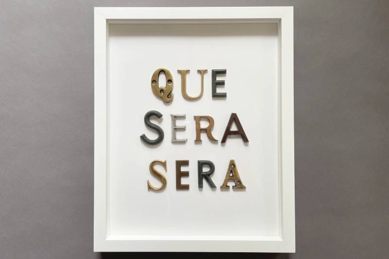 Typo-Bild QUE SERA SERA